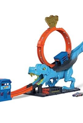 Hot Wheels - Hot Wheels City Pista con 1 macchinina, sfreccia attraverso un loop gigante per sconfiggere il mega dinosauro, pista acrobatica da corsa con T-Rex, giocattolo per bambini 4+ Anni, HNP77
